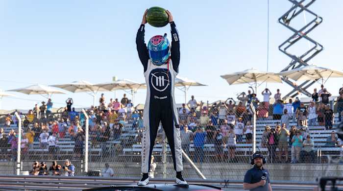 Ross Chastain (1) celebrates winning a NASCAR Cup Series auto race at Circuit of the Americas, Sunday, March 27, 2022, in Austin, Texas.